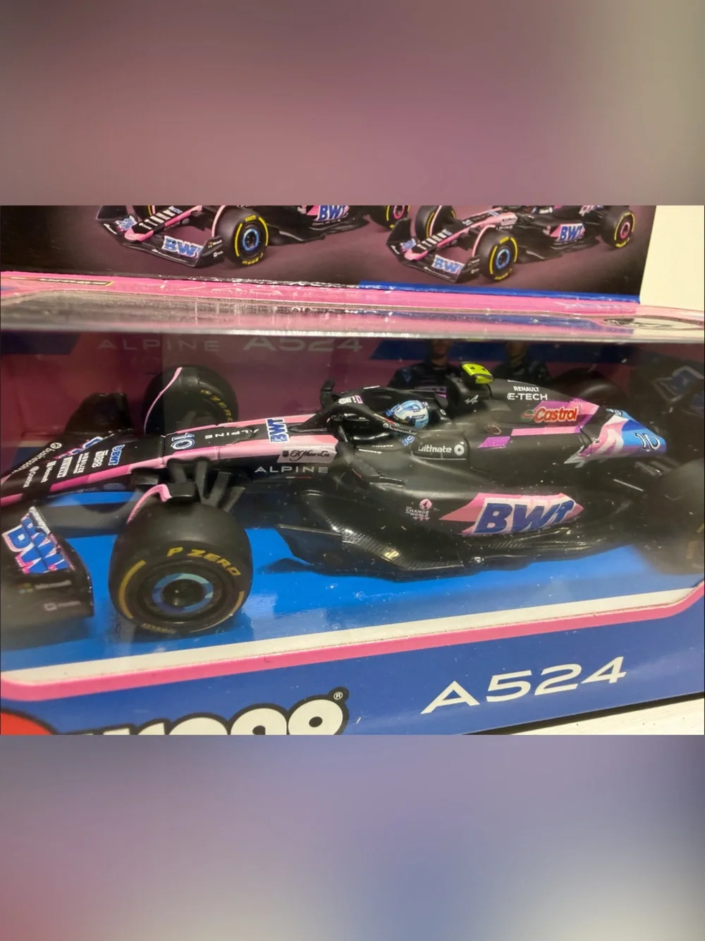 Bburago A524 BWT Alpine F1 Team Diecast Car - Pink & Blue with driver
